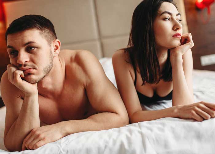 couple thinking in the bed