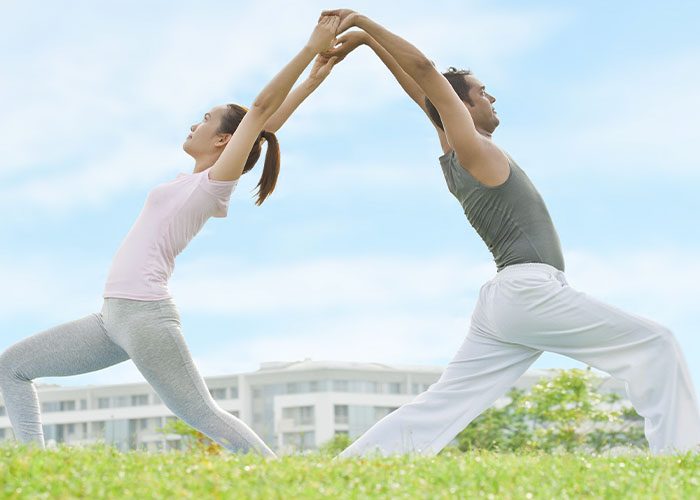 couple doing yoga