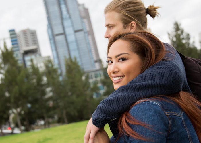 couple on a walk in Melbourne park