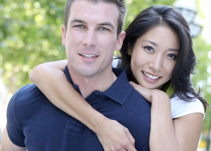 white guy with asian woman