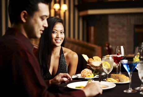 man with japanese woman in a restaurant