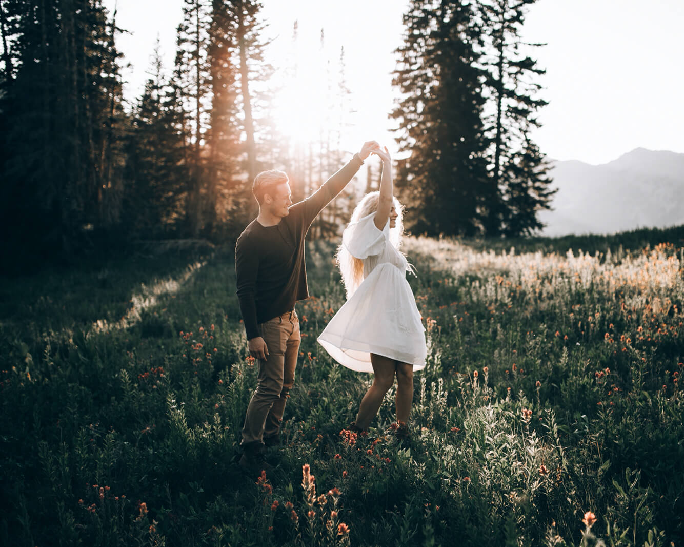 happy couple in forest