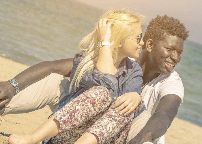 white girl with black guy on the beach