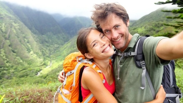 couple in green montains