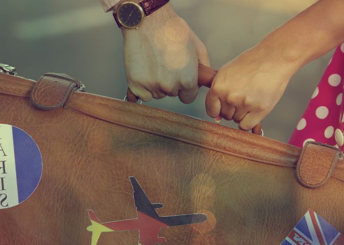 man and woman holds bag