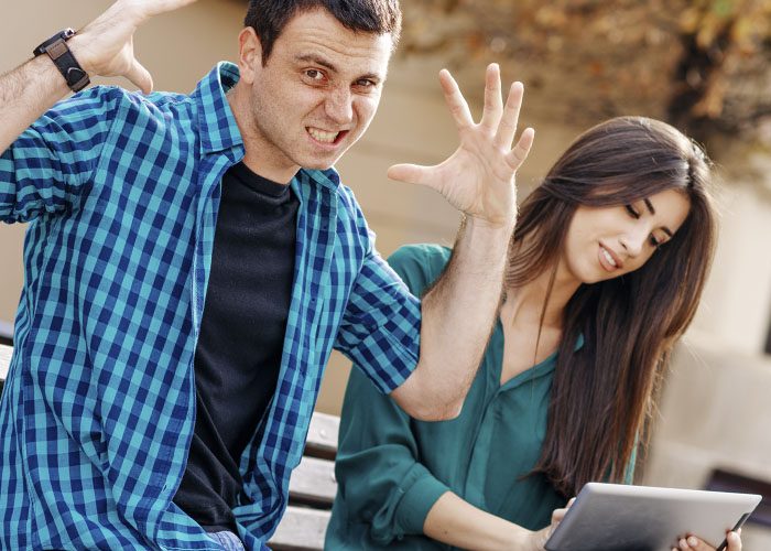 man and woman with tablet