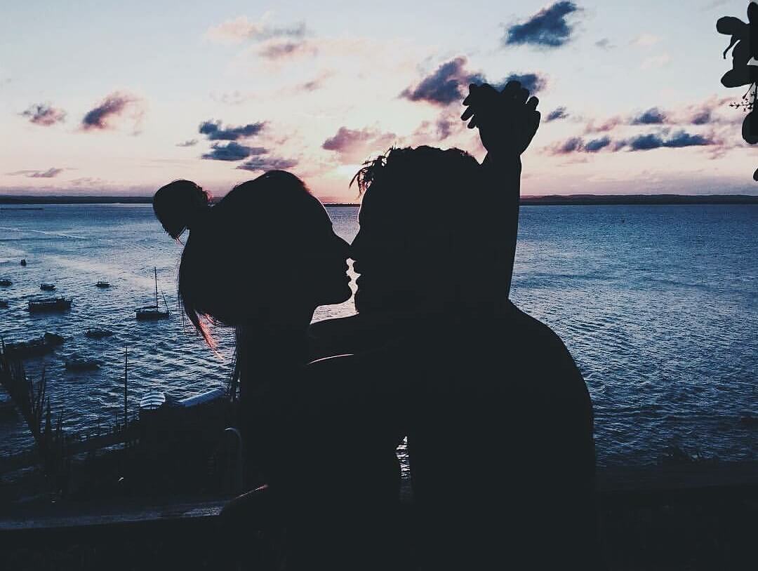 couple near the lake before kiss